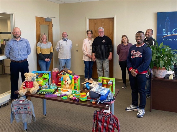 La Capitol FCU Collects Toys, Clothes for Adopted Family